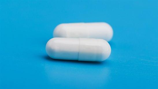 White pill capsule