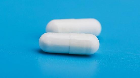 White pill capsule